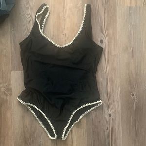 One piece scoop/open back